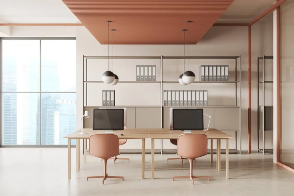 Beige business interior with armchairs and pc computer on desk, light concrete floor. Coworking zone with shelf and business folders. Panoramic window on city view. 3D rendering