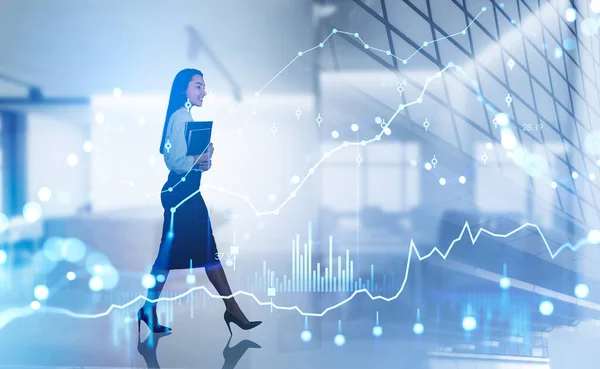 Businesswoman smiling and walking with notebook in hands, double exposure of conference room, stock market lines and forex candlesticks. Concept of financial analysis