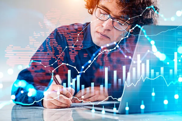 Businessman with serious look, sign a business contract, double exposure with glowing candlesticks and forex diagrams, earth map. Concept of financial analysis and world economy