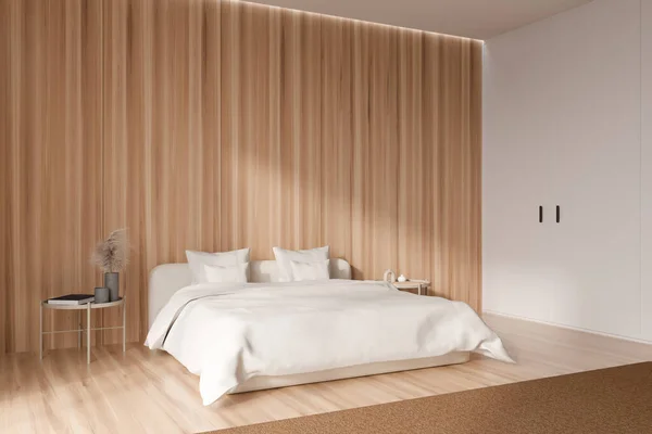 サイドビュー 堅木の床にカーペット付きのライトベッドルームのインテリアベッドとナイトスタンド 空の壁をコピーします 3Dレンダリング — ストック写真