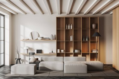 Modern ev ofisinin ve oturma odasının içinde beyaz duvarlar, siyah ahşap zemin, bilgisayar masası, ahşap dolap ve rahat gri kanepe. 3d oluşturma