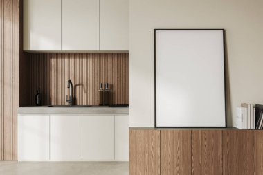 Lavabo ve raflarla bej mutfak içi, açık beton zemin. Ahşap çekmecede kitaplar ve sahte tuval posterler. Dairede modern minimalist yemek alanı. 3B görüntüleme