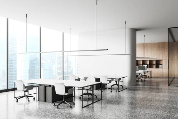 Stylish office interior with shared table and chairs, side view coworking zone behind partition. Workplace corner with panoramic window on skyscrapers. 3D rendering