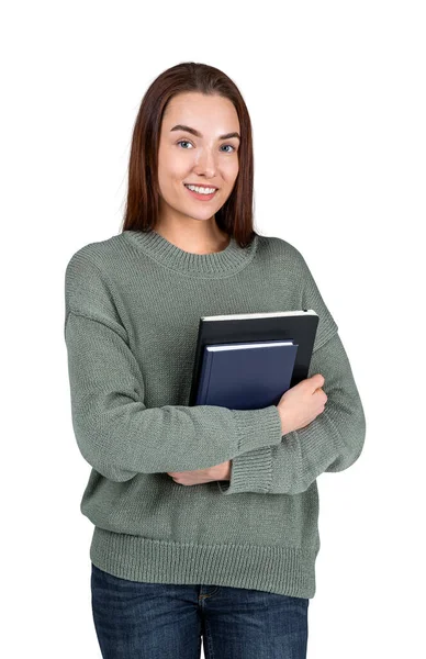 女性の学生は カメラを見て 腕の中で教科書や本を保持 白い背景の上に隔離された ビジネス教育の概念 — ストック写真