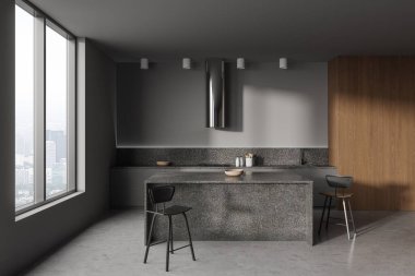 Gri ve ahşap duvarları olan modern mutfağın içi, lavabo, fırın ve tabureli bar tezgahı olan gri dolaplar. Bulanık şehir manzaralı büyük bir pencere. 3d oluşturma