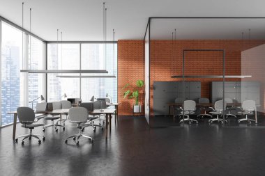 Cam kapılar ardında çalışma odası ve konferans odası olan tuğla ofis içi. Koltukları, bilgisayarları ve rafları olan sıra sıra. Gökdelenlerin panoramik penceresi. 3B görüntüleme