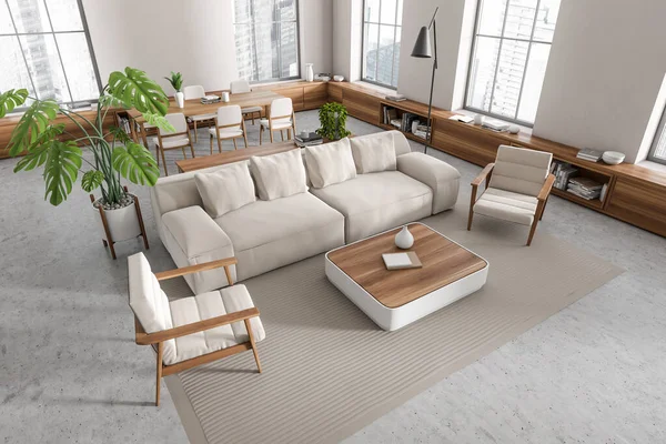 Eckblick Auf Helle Studiozimmereinrichtung Mit Esstisch Sofa Sesseln Teppich Betonboden — Stockfoto