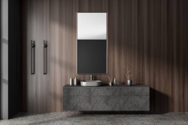 İçinde lavabo ve aksesuarlar, dikey ısıtılmış havlu korkuluğu ve gri beton zemin olan koyu ahşap bir banyo. Modern çağdaş dairede banyo. 3B görüntüleme