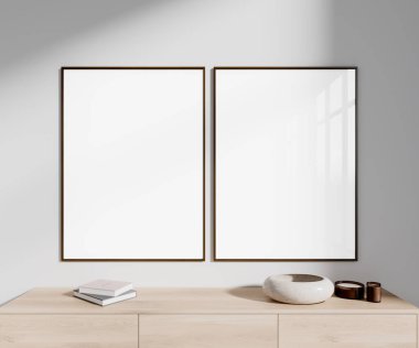 Modern oturma odasının içinde beyaz duvarlar, açık ahşap şifonyer ve üzerinde iki tane dikey maket poster asılı. 3d oluşturma