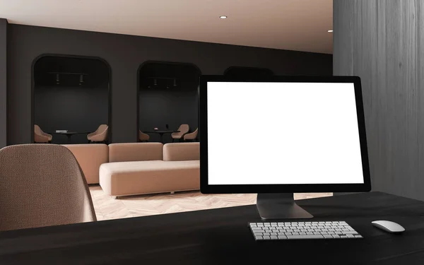Computer monitor with blank screen standing on wooden table in stylish bank with gray and dark wooden walls and cubicles with beige chairs. Concept of advertising. 3d rendering