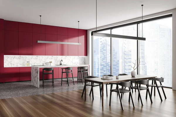 Stylish home kitchen interior with dinner table, side view marble bar island and kitchenware. Cooking and eating corner with panoramic window on skyscrapers. 3D rendering