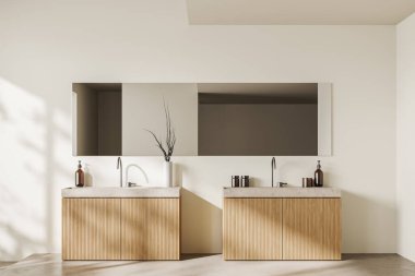 Çift lavabolu ve büyük aynalı bej banyo içi, otel banyo aksesuarlı güverte, açık beton zemin. 3B görüntüleme