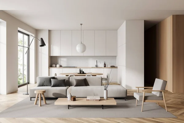 Hvid Atelier Interiør Med Chill Område Sofa Med Lænestol Spisebord - Stock-foto