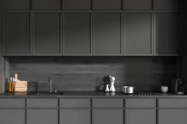 Karanlık mutfak içinde lavabo, soba ve modern mutfak gereçleri var. Otel dairesinde yemek pişirme alanı, 3D görüntüleme