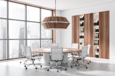 Beyaz toplantı köşesi koltuklu, yuvarlak masalı, yan manzaralı aydınlık beton zeminli dolap. Singapur şehir manzarasında panoramik pencere. 3B görüntüleme