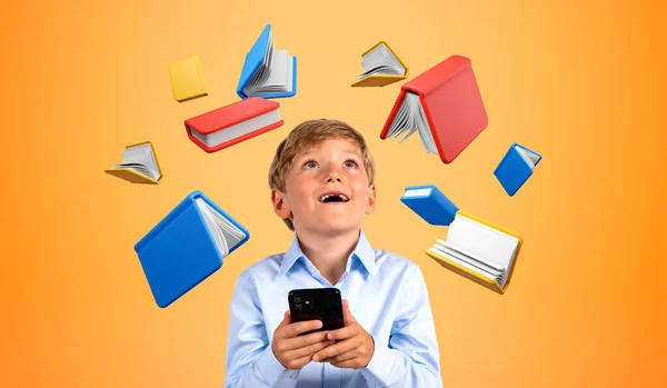 Portrait Smiling Little Boy Holding Smartphone Orange Background Books Him — Stock Photo, Image