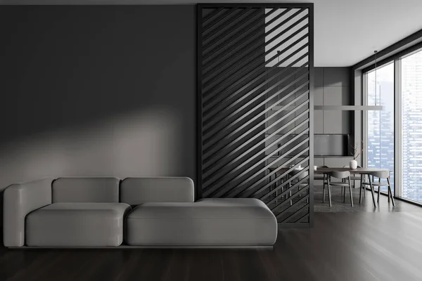 现代化厨房的内部有灰色的墙壁 灰色的橱柜 餐桌有椅子 客厅有舒适的灰色沙发在前景 3D渲染 — 图库照片