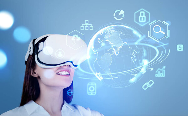 Businesswoman in vr headset smiling, looking at digital earth hologram with icons hud. Metaverse and global connection. Concept of global internet and digital marketing