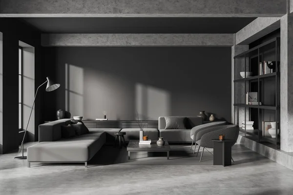 黑暗的客厅内部 沙发和两个扶手椅 架子和抽屉与装饰 灰色混凝土地板 全景窗 模拟空灰墙 3D渲染 — 图库照片