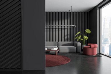 Gri duvarları, uzun gri koltuğu, rahat kahverengi koltuğu ve yuvarlak kahverengi halısı olan modern oturma odasının içi. Soldaki boş duvar. 3d oluşturma