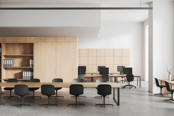 White office interior with meeting table and coworking area with pc computer, wooden shelves with documents. Modern business room with technology. 3D rendering