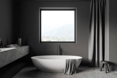 Gri beton zeminde lavabo ve küvetin olduğu koyu bir banyo. Güverte otel banyo aksesuarları ve panoramik pencereli. 3B görüntüleme