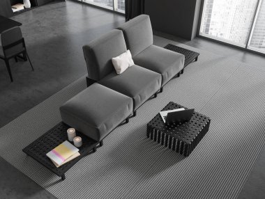 Koyu renk oturma odasının içini kahve masası, kanepe, dizüstü bilgisayar, sandalyeli masa, gri duvar, panoramik pencere, kitaplar, beton zemin, halı. Minimalist tasarım kavramı. 3d oluşturma