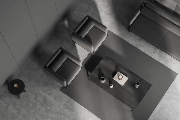顶部的黑暗客厅内部与两个扶手椅和咖啡桌的地毯 沙发和艺术装饰 灰色混凝土地板 3D渲染 — 图库照片