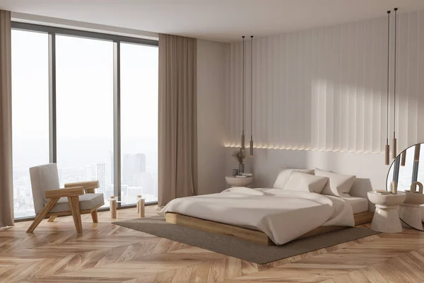 Interior of stylish master bedroom with white walls, wooden floor, comfortable king size bed with white cover, armchair and glass coffee table. 3d rendering