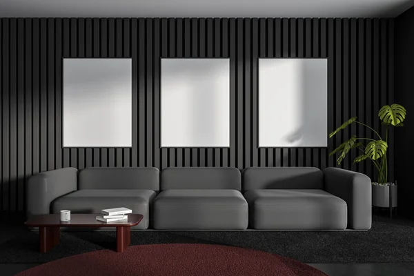 グレーの壁 長い灰色のソファ 3つのモックアップのポスターは ラウンド茶色のカーペットの上にぶら下がっている現代のリビングルームのインテリア 3Dレンダリング — ストック写真