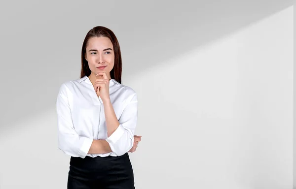 Pondering Attractive Businesswoman Wearing Formal Wear Standing Touching Chin Empty — Stock Photo, Image