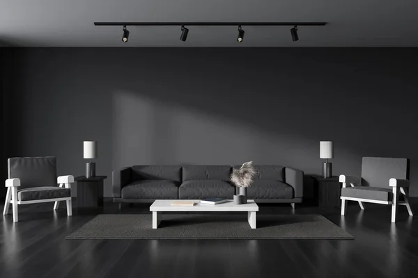 Front view on dark living room interior with empty grey wall, coffee table, sofa, armchairs, carpet, books, wooden floor. Concept of minimalist design. 3d rendering