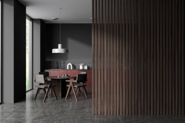 Mutfağın içinde sandalyeler ve gri beton zeminde yemek masası var. Mutfak eşyaları ve aletler güvertede. Tropik bölgelerde panoramik pencere. Boş ahşap kopyalama bölmesi. 3B görüntüleme