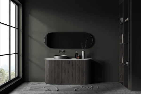 暗い灰色の壁 コンクリートの床 暗い木製のキャビネットと楕円形の鏡の上に立って快適なラウンドシンクとスタイリッシュなバスルームのインテリア 3Dレンダリング — ストック写真