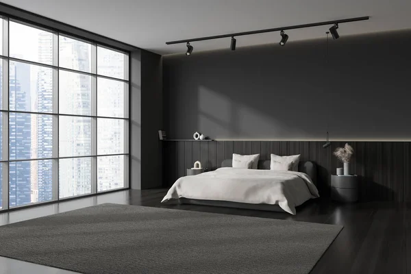 Dark bedroom interior bed and nightstand with art decoration, side view, black hardwood floor. Sleeping zone with panoramic window on Singapore. Mockup empty wall. 3D rendering