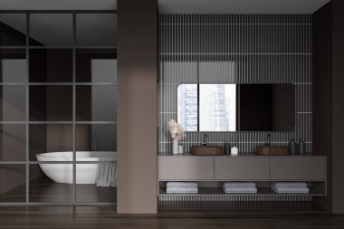 Kahverengi banyo, çift lavabo ve cam kapılar ardında küvet. Singapur 'da otel banyosu aksesuarları ve panoramik pencereli bir elbise. 3B görüntüleme