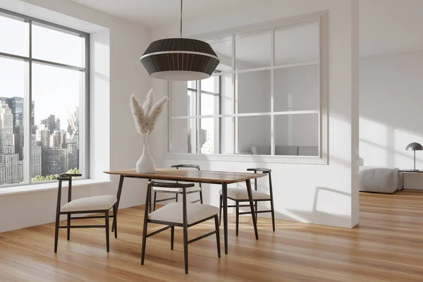 White living room interior with dining table and chairs, side view, sofa in the corner on hardwood floor. Panoramic window on New York city view. 3D rendering