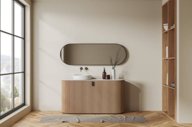 Modern banyo, bej duvarlar, ahşap zemin, ahşap dolapta duran rahat lavabo ve oval ayna. 3d oluşturma