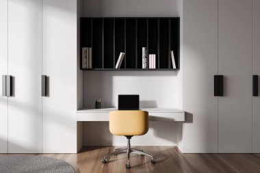 Masasında dizüstü bilgisayarı, koltuğunda koltuğu ve yerde halısı olan beyaz bir çocuk odası. Rafı ve kitapları olan minimalist çocuk işyeri. 3B görüntüleme