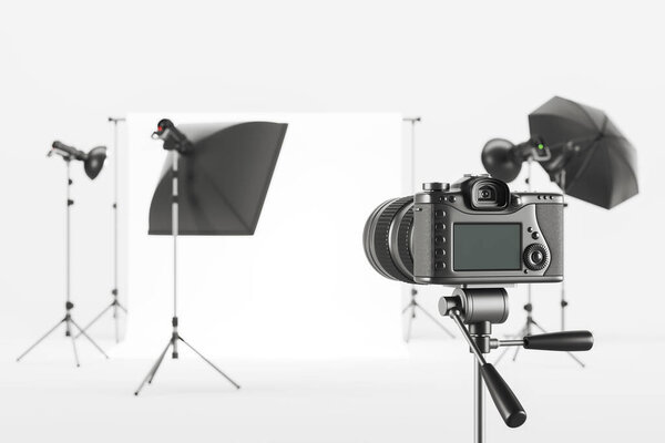 Photo camera and studio room with professional equipment and cyclorama. Tripod, soft box, standing lamp, umbrella and spotlights. Concept of shooting. 3D rendering illustration