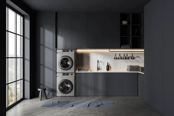 暗色洗衣房 有隐藏的架子 洗衣机和用水槽和毛巾的器具 现代公寓 全景窗户在农村 灰色混凝土地板 3D渲染 — 图库照片