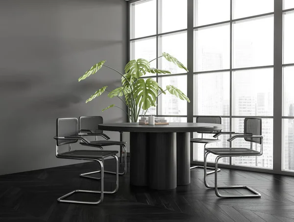 Dark living room interior with dining table and chairs, side view, black hardwood floor. Panoramic window on Singapore skyscrapers. Plant decoration in the corner. 3D rendering