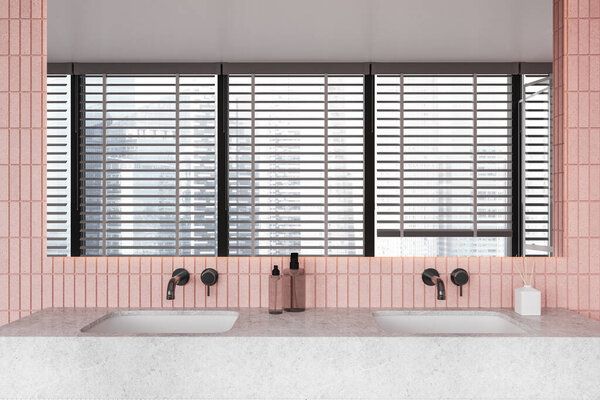 Interior of modern bathroom with pink tile walls, massive white double sink and long horizontal mirror hanging above it. 3d rendering