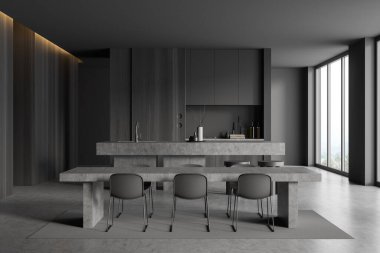 Karanlık mutfak masası, sandalyeler, gri beton zeminde taburesi olan bar adası. Yemek pişirme alanı ve kırsal alanda panoramik pencere. 3B görüntüleme