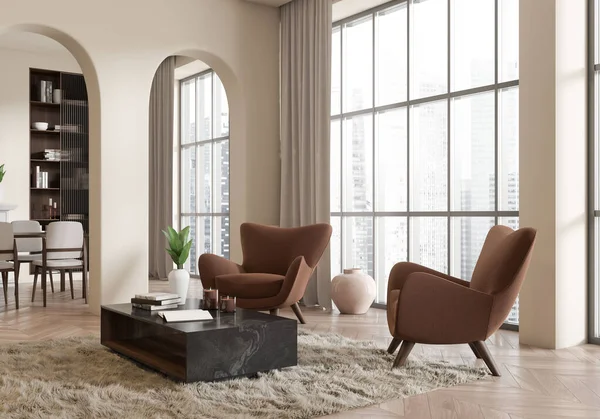Beige living room interior with armchairs and coffee table, side view. Archways and dining zone with table and shelf with decoration. Panoramic window on Singapore skyscrapers. 3D rendering