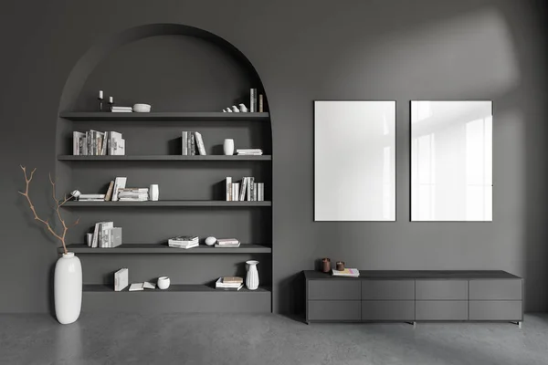 Dark living room interior with sideboard and shelf with art decoration, vase with branch on grey concrete floor. Two mock up posters in row. 3D rendering