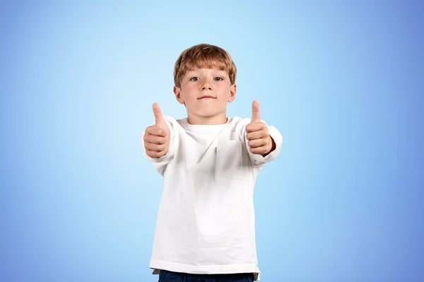 Child Boy Looking Camera Showing Thumbs Copy Space Empty Blue — Stock Photo, Image
