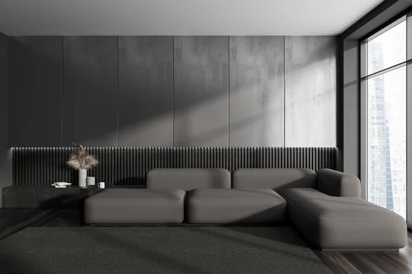 Dark living room interior with soft place and shelf with minimalist decor. Relaxing area with sofa on hardwood floor. Panoramic window on city skyscrapers. Copy space empty wall. 3D rendering