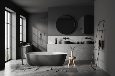 Gri duvarları, beton zemini, rahat gri küveti, iki yuvarlak aynalı çift lavabosu ve duşu olan şık bir banyo. 3d oluşturma
