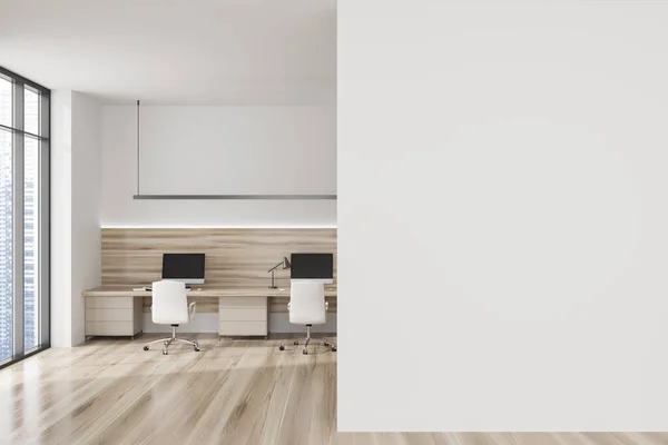 White business interior with pc desktop on table and armchairs on hardwood floor. Workspace with tools and pc computers in row. Panoramic window on skyscrapers. Mockup copy space. 3D rendering